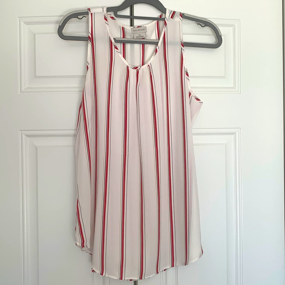 Sleeveless top perfect for layering with a sweater or wear alone.